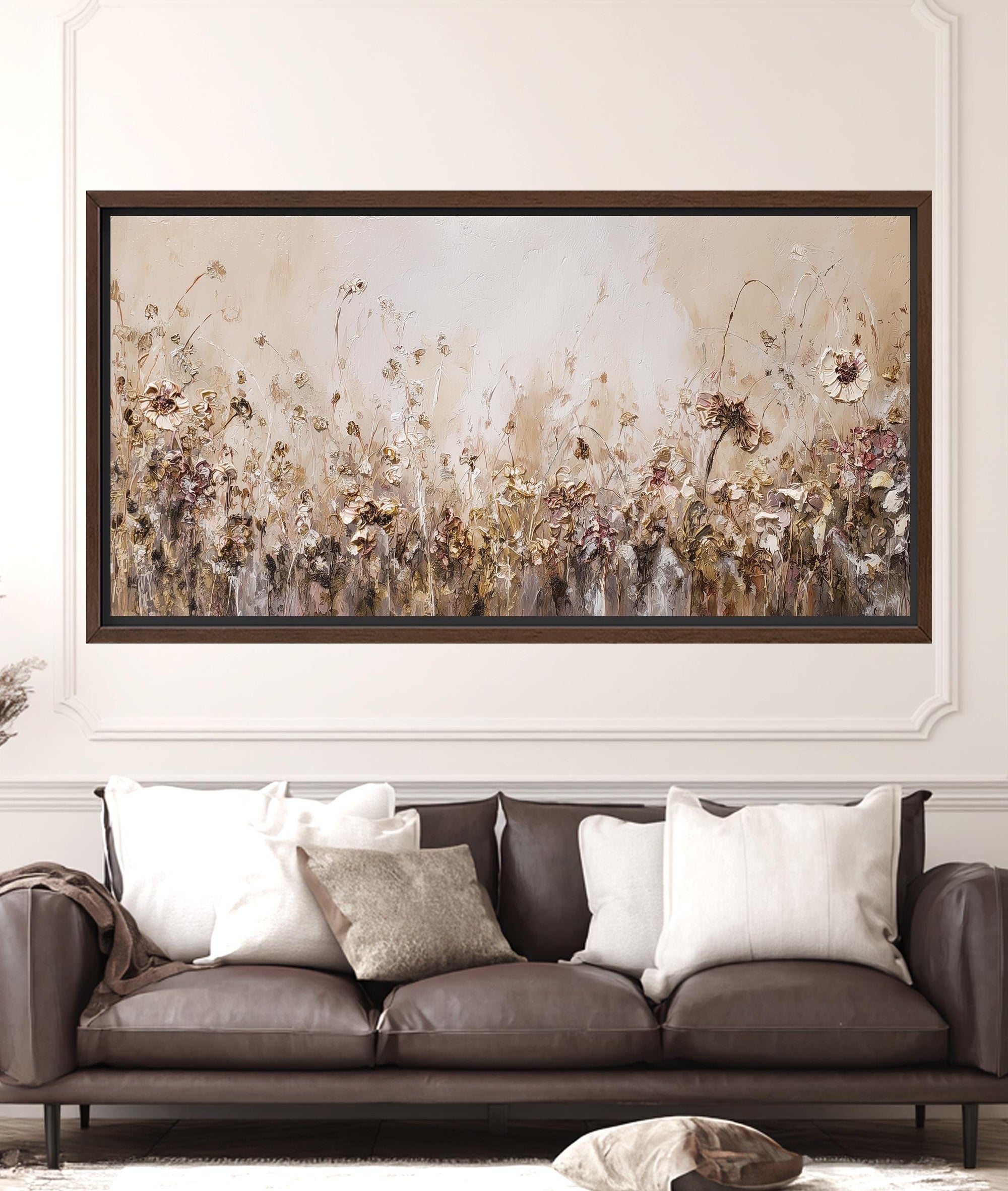 Neutral floral wall art above sofa