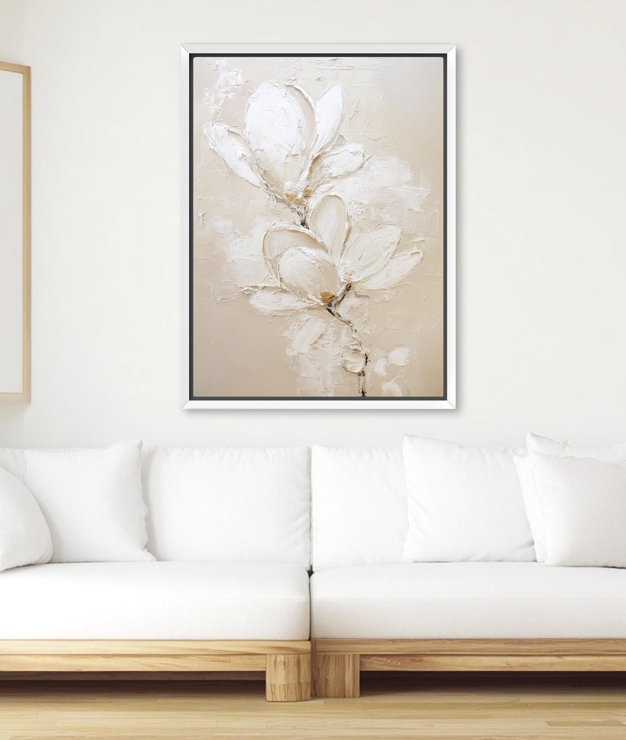 white floral wall art with textured paint on beige background